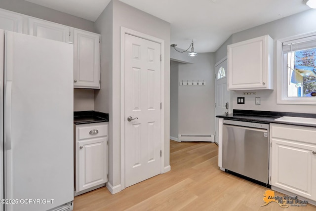 kitchen with a baseboard heating unit, freestanding refrigerator, light wood-style floors, white cabinets, and stainless steel dishwasher