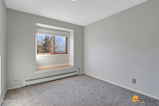 carpeted empty room featuring baseboards and baseboard heating