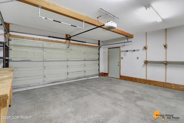 garage featuring a garage door opener