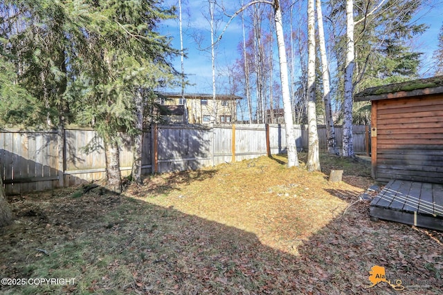 view of yard with a fenced backyard