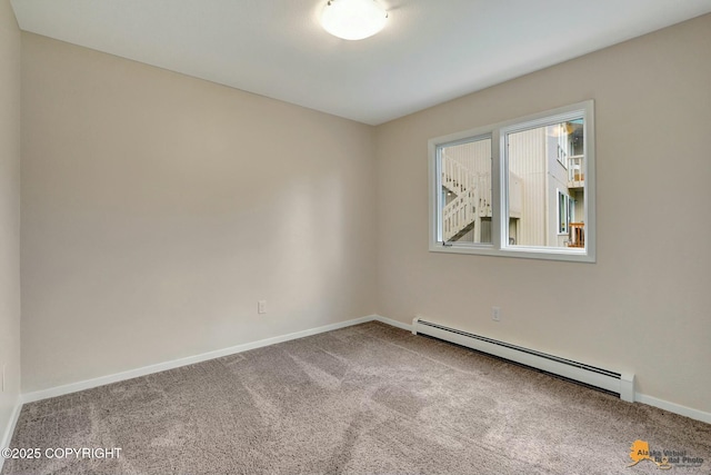 carpeted empty room with baseboards and a baseboard radiator