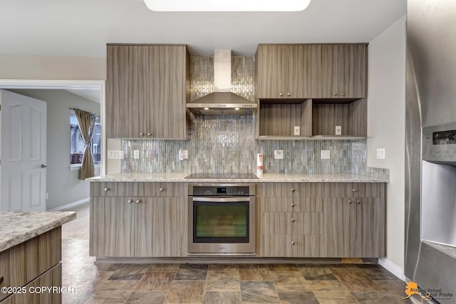 1091 Northpointe Bluff Dr, Anchorage, AK 99501 - kitchen with appliances with stainless steel finishes, wall chimney range hood, decorative backsplash, and light stone counters