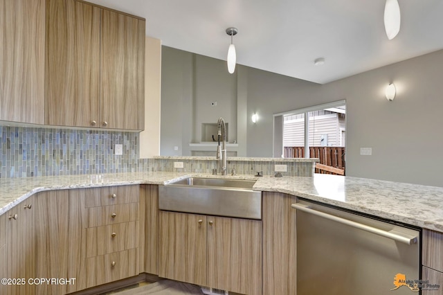 1091 Northpointe Bluff Dr, Anchorage, AK 99501 - kitchen featuring dishwasher, light brown cabinets, light stone counters, and tasteful backsplash