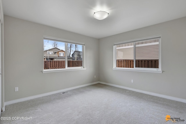 1091 Northpointe Bluff Dr, Anchorage, AK 99501 - empty room with carpet and baseboards