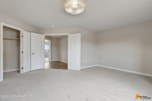 1091 Northpointe Bluff Dr, Anchorage, AK 99501 - unfurnished bedroom with carpet and a closet