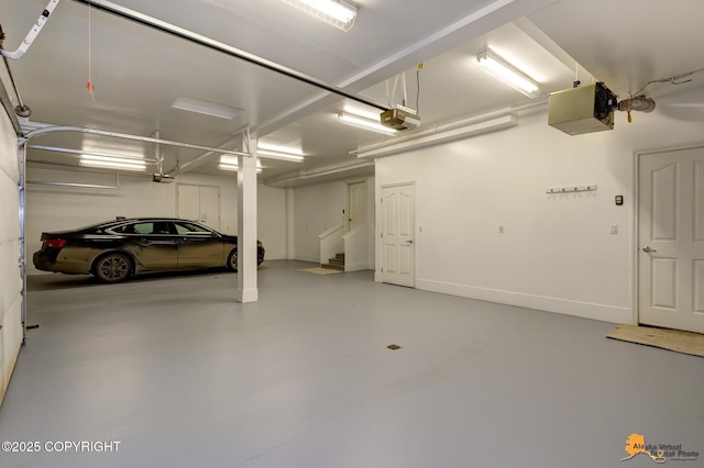 1091 Northpointe Bluff Dr, Anchorage, AK 99501 - garage featuring a garage door opener