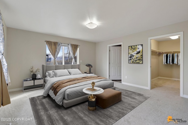 1091 Northpointe Bluff Dr, Anchorage, AK 99501 - carpeted bedroom featuring baseboards and a spacious closet