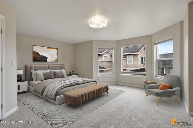 1091 Northpointe Bluff Dr, Anchorage, AK 99501 - carpeted bedroom featuring baseboards