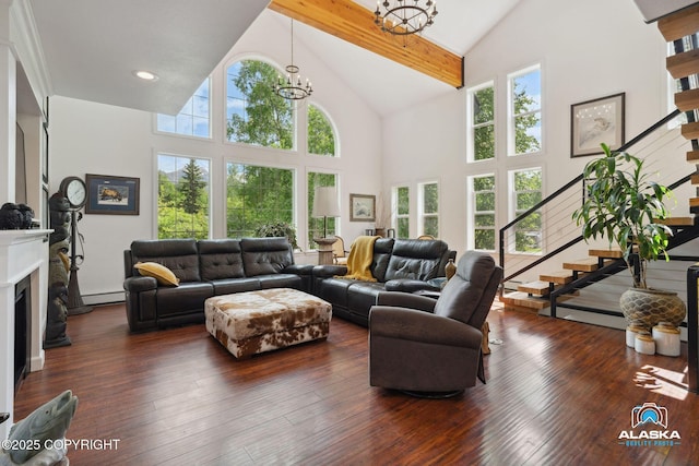 19136 S Birchwood Loop Rd, Chugiak, AK 99567 - living room featuring a chandelier, high vaulted ceiling, stairs, a fireplace, and baseboard heating