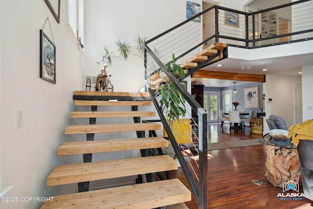 19136 S Birchwood Loop Rd, Chugiak, AK 99567 - stairs with wood finished floors, a towering ceiling, and recessed lighting