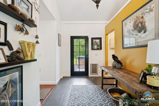 19136 S Birchwood Loop Rd, Chugiak, AK 99567 - foyer with dark tile patterned flooring, baseboards, and wine cooler