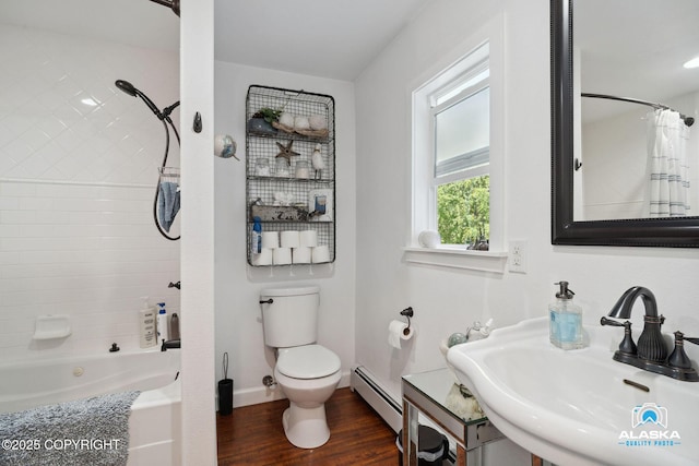 19136 S Birchwood Loop Rd, Chugiak, AK 99567 - full bathroom with a baseboard heating unit, a sink, toilet, shower / bath combination with curtain, and wood finished floors