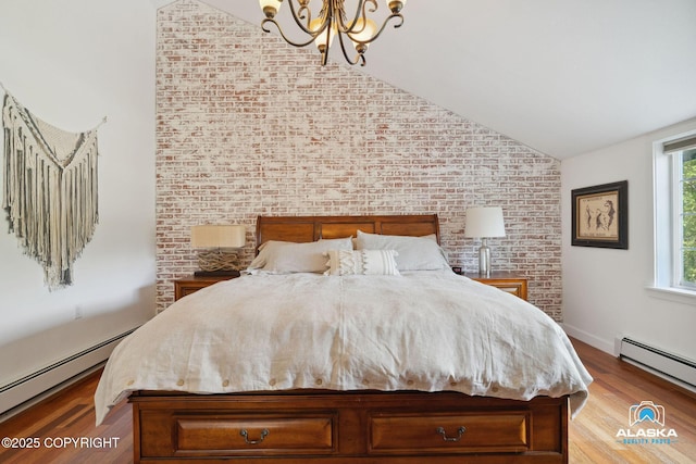 19136 S Birchwood Loop Rd, Chugiak, AK 99567 - bedroom featuring brick wall, lofted ceiling, baseboard heating, a chandelier, and wood finished floors