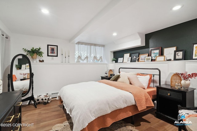 19136 S Birchwood Loop Rd, Chugiak, AK 99567 - bedroom featuring wood finished floors, baseboard heating, and recessed lighting