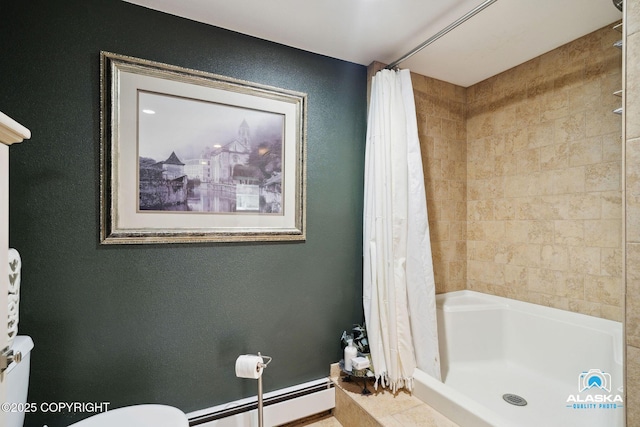 19136 S Birchwood Loop Rd, Chugiak, AK 99567 - bathroom featuring baseboard heating, toilet, and tiled shower / bath