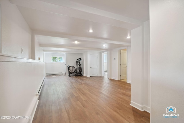 19136 S Birchwood Loop Rd, Chugiak, AK 99567 - corridor with baseboard heating, wood finished floors, baseboards, and recessed lighting