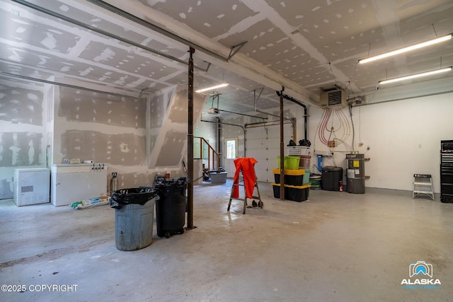 19136 S Birchwood Loop Rd, Chugiak, AK 99567 - garage featuring a heating unit