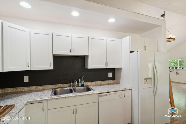 19136 S Birchwood Loop Rd, Chugiak, AK 99567 - kitchen with white appliances, a sink, white cabinets, recessed lighting, and wood finished floors