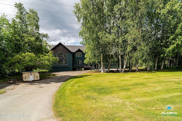 19136 S Birchwood Loop Rd, Chugiak, AK 99567 - view of front of house with a front yard