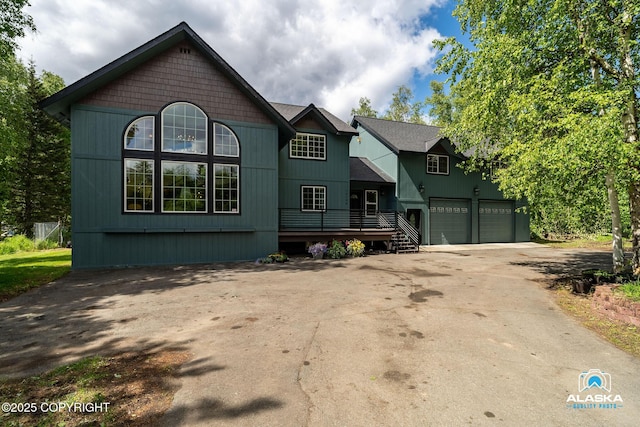 19136 S Birchwood Loop Rd, Chugiak, AK 99567 - view of front of property featuring concrete driveway and an attached garage