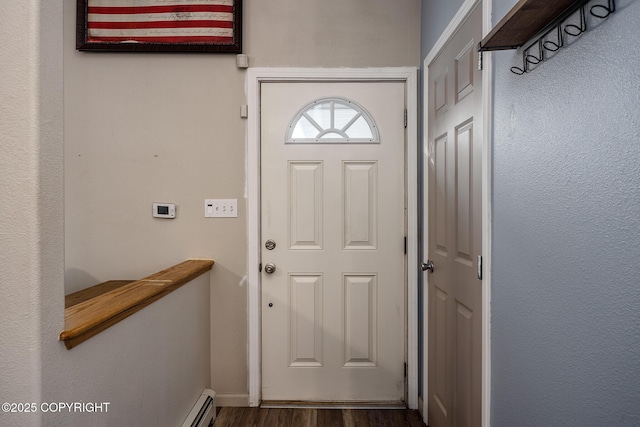 doorway to outside with dark wood-type flooring