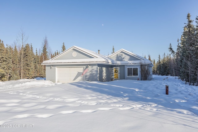 view of front of property featuring a garage