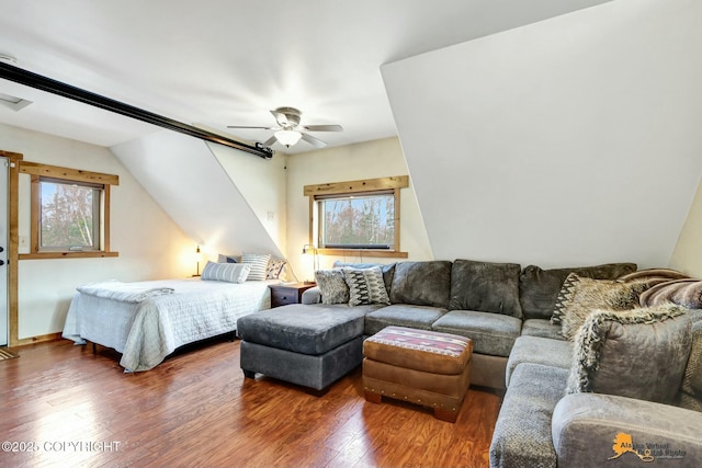 bedroom with a ceiling fan and wood finished floors