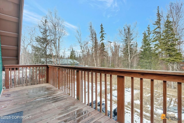 view of snow covered deck