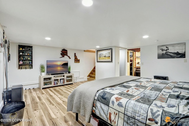 bedroom featuring recessed lighting, baseboards, and light wood finished floors