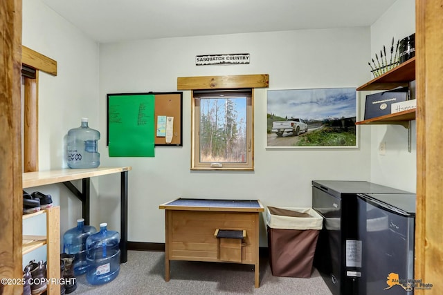 interior space featuring baseboards