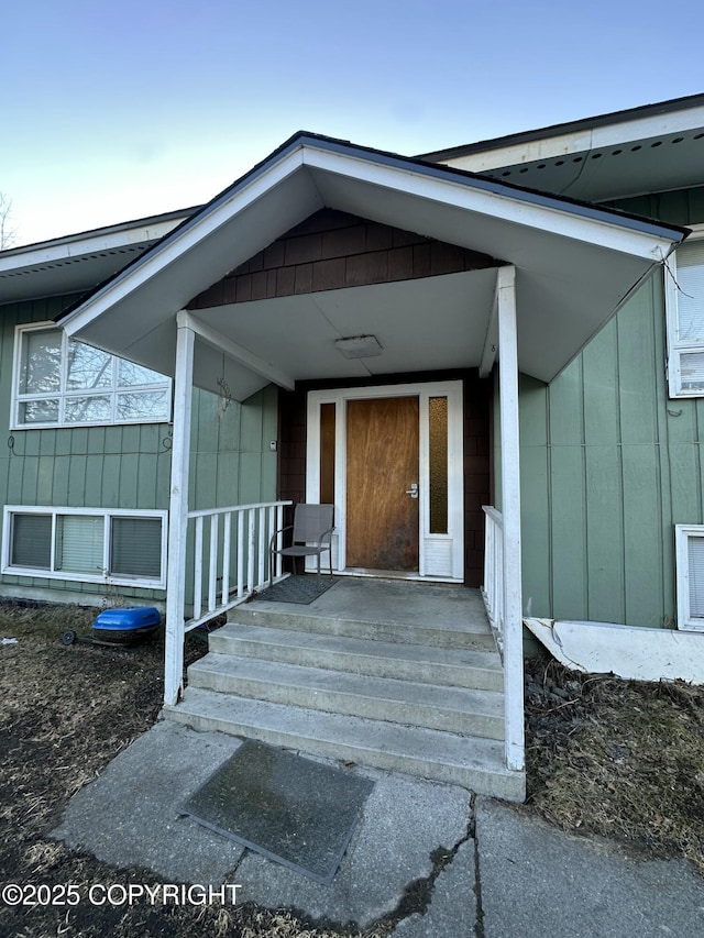 property entrance with a porch