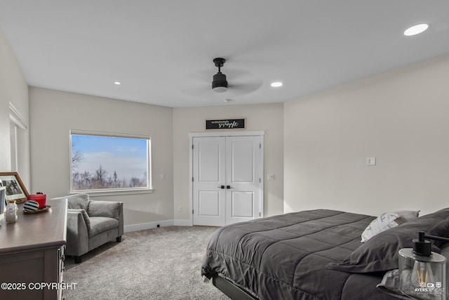 bedroom featuring light carpet, recessed lighting, a ceiling fan, and baseboards