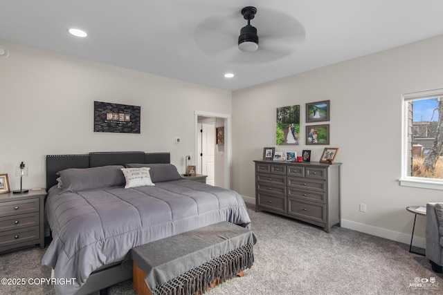 bedroom with recessed lighting, light colored carpet, a ceiling fan, and baseboards