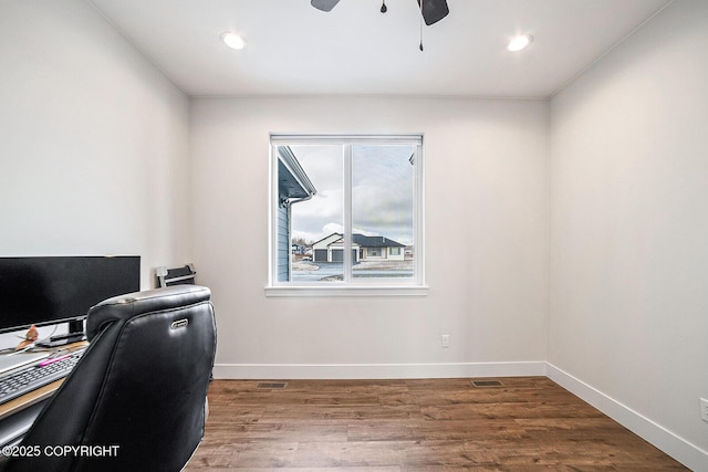 office space featuring recessed lighting, baseboards, wood finished floors, and a ceiling fan