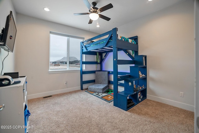 carpeted bedroom with recessed lighting, visible vents, and baseboards