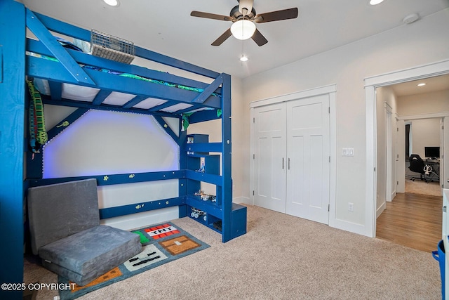 bedroom with baseboards, recessed lighting, ceiling fan, a closet, and carpet flooring