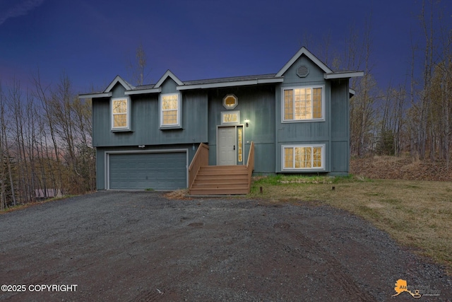 2751 N Barrys Resort Dr, Wasilla, AK 99654 - raised ranch with an attached garage and dirt driveway