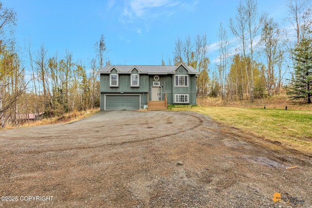 2751 N Barrys Resort Dr, Wasilla, AK 99654 - bi-level home with an attached garage and driveway