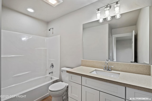 full bathroom featuring vanity,  shower combination, and toilet