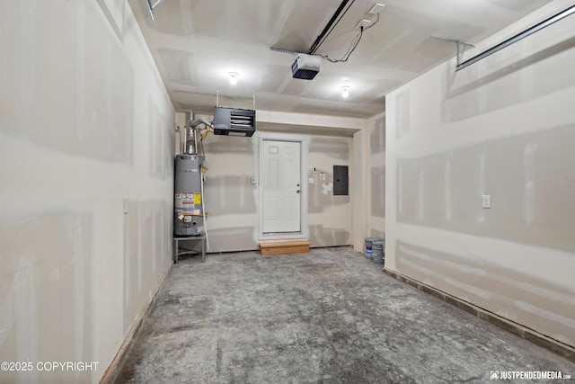 garage featuring electric panel, gas water heater, and a garage door opener