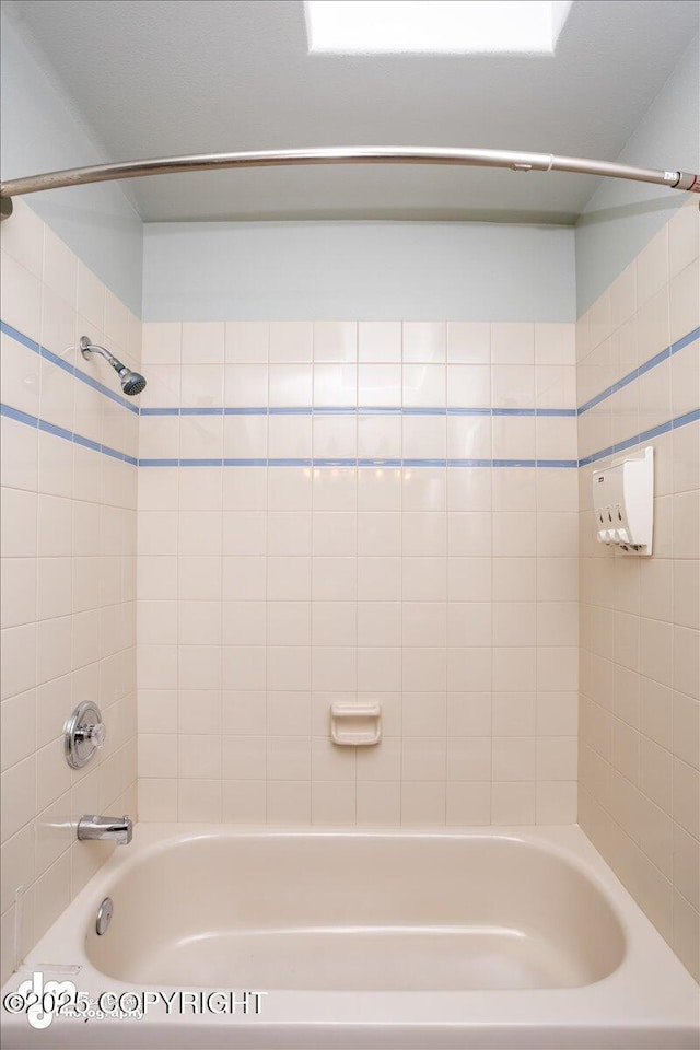 bathroom featuring bathing tub / shower combination