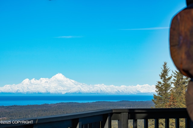 view of mountain feature featuring a water view