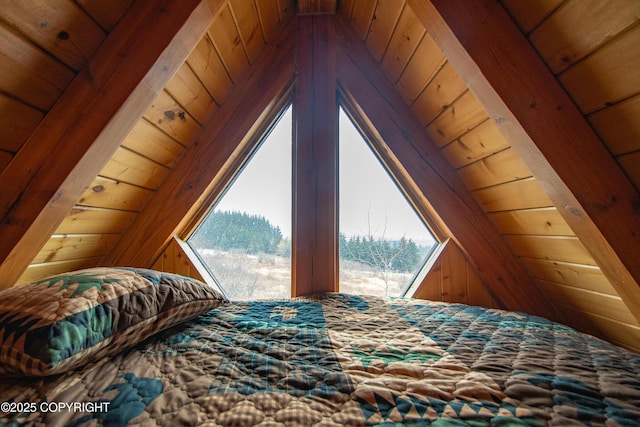 bedroom featuring vaulted ceiling with beams and wood ceiling