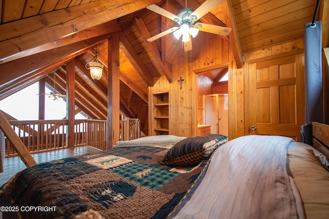 bedroom with beam ceiling, high vaulted ceiling, wood ceiling, and wood walls