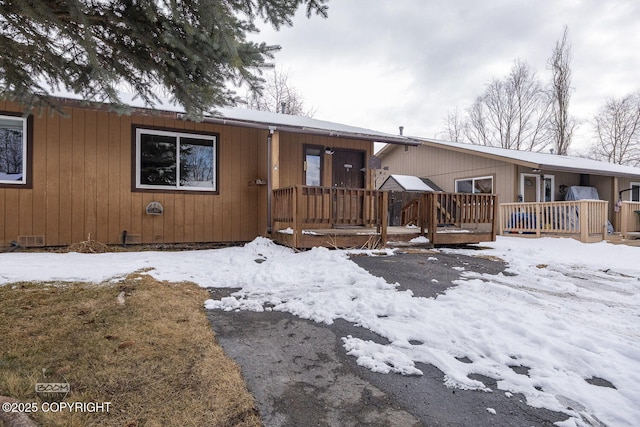 view of front of house featuring a deck