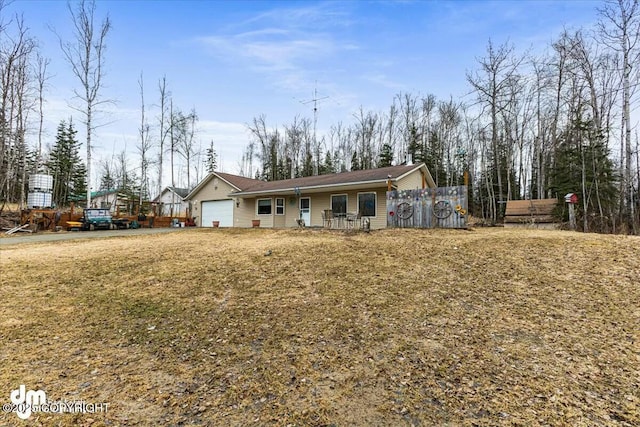 single story home with a garage