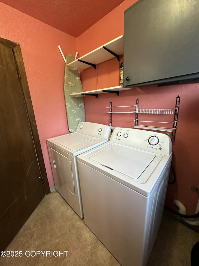 laundry room with laundry area and separate washer and dryer