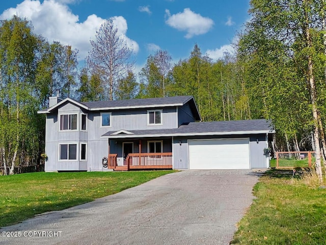 2500 S Tundra Rose Dr, Wasilla, AK 99623 - view of front of home with a porch, an attached garage, a front yard, driveway, and a chimney