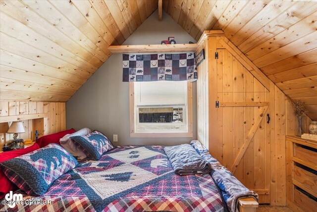 bedroom featuring wooden ceiling and vaulted ceiling