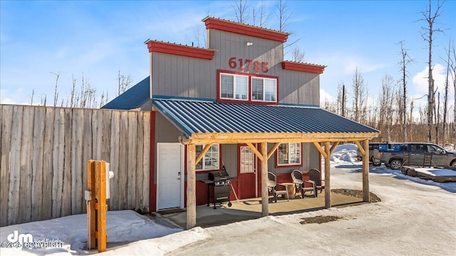 exterior space featuring a patio and fence
